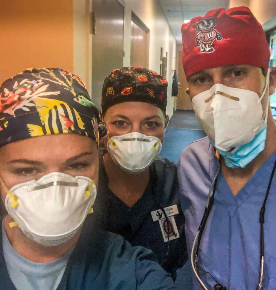 Some of the Prairie Dental Group team wearing caps and surgical masks to prevent COVID-19 spread