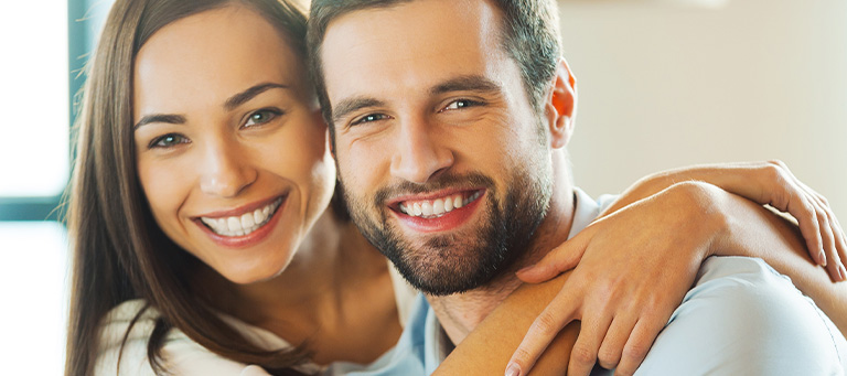 Man and woman smiling