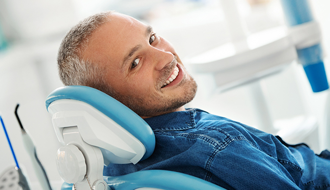 smiling man at the dentist